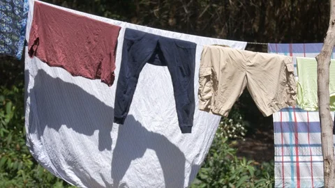 Clothes drying on the clothesline Stock Footage 128077661
