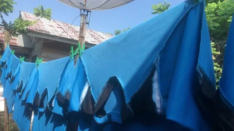 Clothes drying on a clothesline Stock Footage 234950632