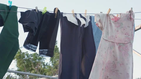 Clothes Drying on a Line in Tropical Daylight Stock Footage 327043272