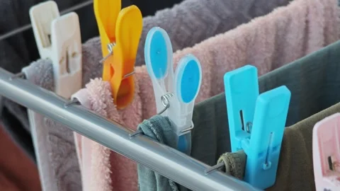 Clothes Drying on a Metal Clothes Rack Vidéo 315361385