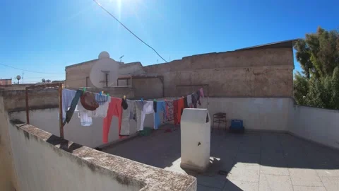 Clothes drying in a Moroccan rooftop 動画素材 165233961