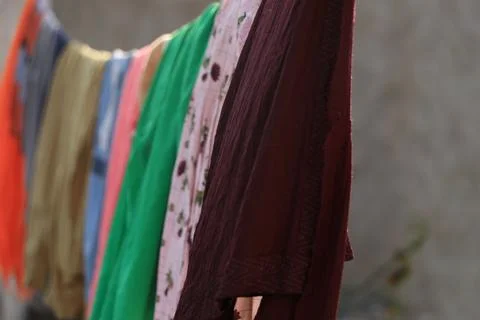 Clothes drying on rope. Stock Photos