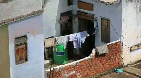 Clothes drying in the sun at poor ghettos Stock Footage 23344989