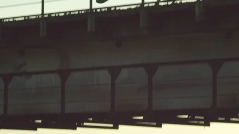 Clothes fall off a bridge into a river Stock Footage 72753909