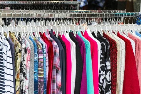 Clothes on a hanger Stock Photos