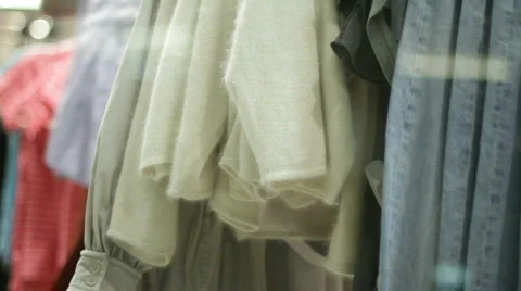 Clothes on hangers  Stock Footage 744053