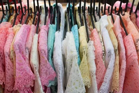 Clothes in hangers Stock Photos