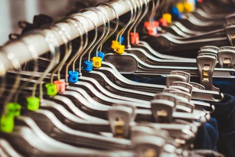 Clothes on hangers Stock Photos