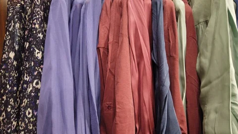 Clothes hanging in a boutique store. Stock Footage 127965669