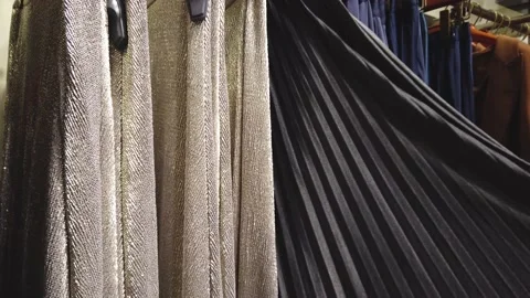 Clothes hanging in a boutique store. Stock Footage 138099153