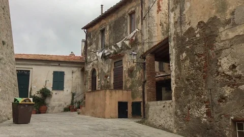 Clothes hanging to dry in the wind in Capalbio Stock Footage 126506573