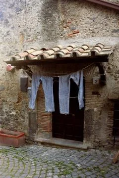 Clothes hanging in front of the door Foto stock