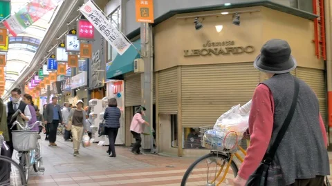 Clothes hanging outside the retail store in Osaka Japan Stock Footage 129274977