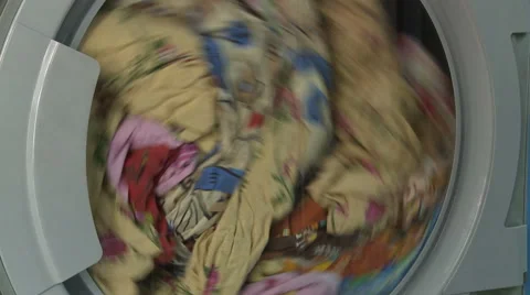Clothes inside washine machine Stock Footage 61750399