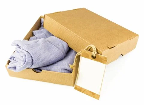 Clothes in open carton Stock Photos