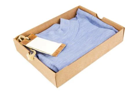 Clothes in open container with blank Stock Photos