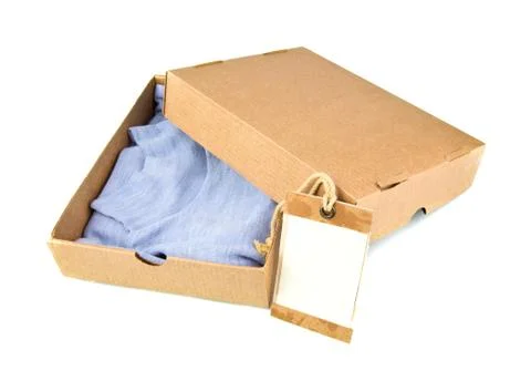 Clothes in open container with card Stock Photos