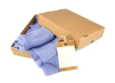 Clothes in open containers with card Stock Photos