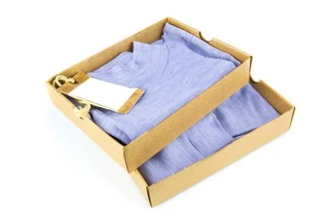 Clothes in open containers with card Stock Photos
