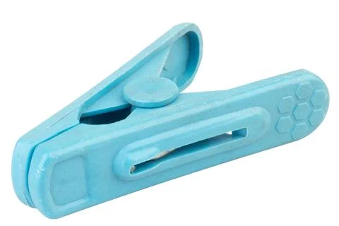 Clothes peg on white tool retro Foto stock
