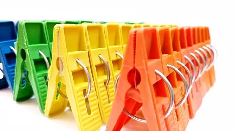 Clothes pegs sets, sets of multi color plastic clothes pins or laundry clips Stock Footage 304688352