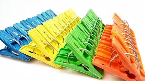 Clothes pegs sets, sets of multi color plastic clothes pins or laundry clips Stock Footage 304688510