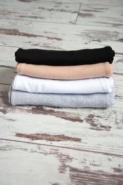 Clothes piled Stock Photos