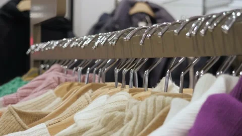 Clothes on a rack in the store. Stock Footage 231904375