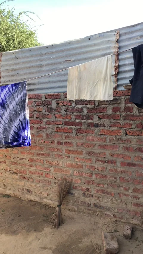 Clothes spread out on a line after washing. Stock Footage 222909679