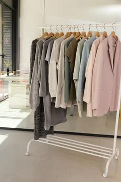 Clothes store with rack of clothes Stock Photos
