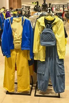 Clothes in the store. vertical Stock Photos