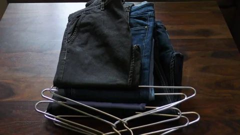 Clothes on table ready for packing up Stock Footage 128201468