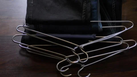 Clothes on table ready for packing up Stock Footage 128201678