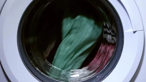 Clothes turn in the washing machine medium shot Video stock 201062829