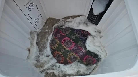 Clothes Washing Inside Machine Drum in Slow Motion Laundry 4K Footage Stock Footage 265487011