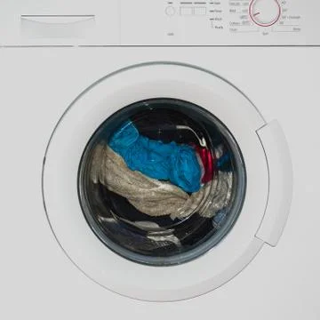 Clothes in washing machine Foto stock