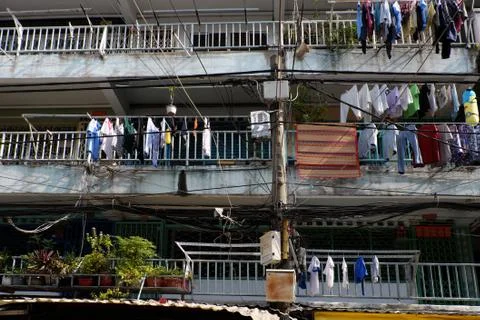 Clothesline at facade building Stock Photos