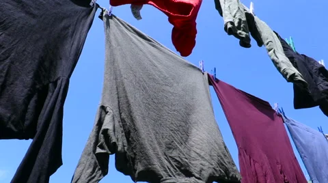 Clothesline moving over blue sky Stock Footage 64801596