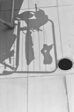 Clothesline shadow Stock Photos