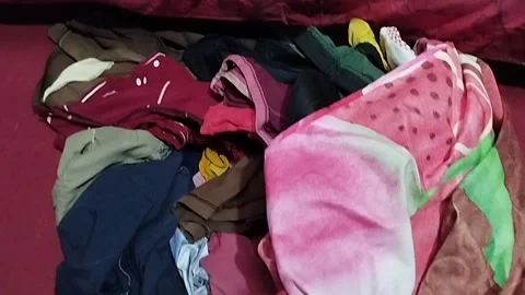 Clotheslines and sheets that have not been folded Stock Footage 218236233