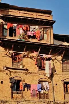 Clotheslines, clothes lines, washing lines with colorful laundry attached to  Foto stock
