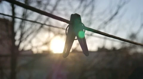 Clothespin on a Background of Sunrice 스톡 동영상 58697125
