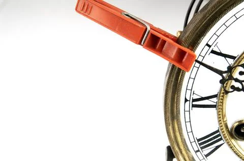 Clothespin stop the clock. Stock Photos