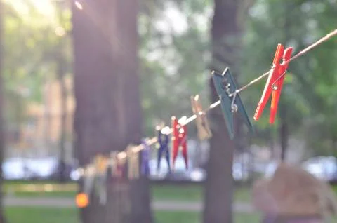 Clothespins on clothesline Stock Photos