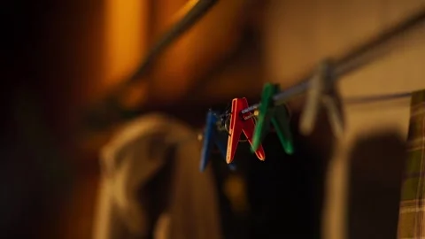 Clothespins Hanging on Line in Warm Light Stock Footage 344235768