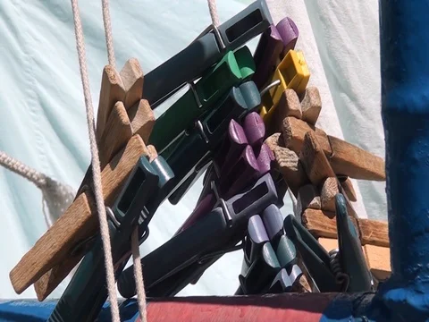 Clothespins hanging on a rope. Stock Footage 70512260