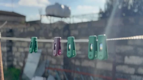 Clothespins Hanging from a Rope Stock Footage 297731011