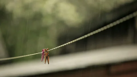 Clothespins in the rain Stock Footage 50398873