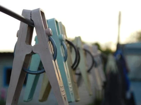 Clothespins on a rope Stock Photos