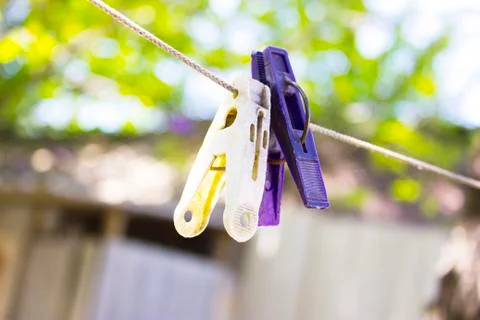 Clothespins on a rope Foto stock